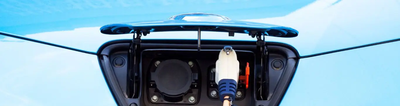 Charging cable plugged into an electric vehicle
